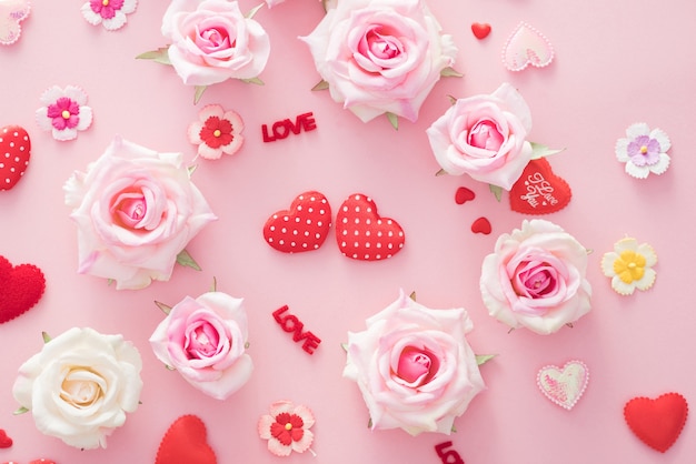 Valentine Day gift box with red hearts and roses on pink backgro