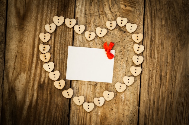 Photo valentine day, heart on wood table