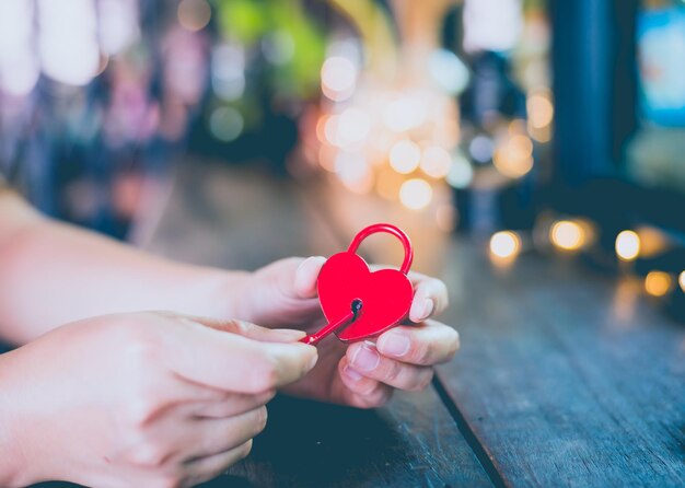 Valentine Day and love concept with heart shaped padlock. Sweetest key and romance symbol for unlock.