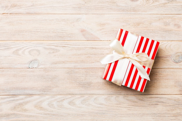 Valentine gift box on colored background