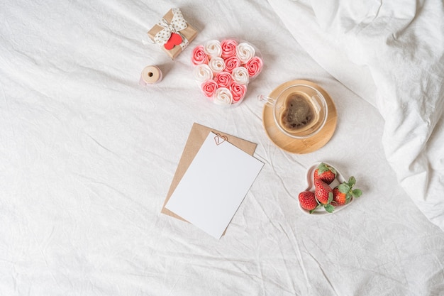 Valentine's Day, breakfast on bed with blank greeting card