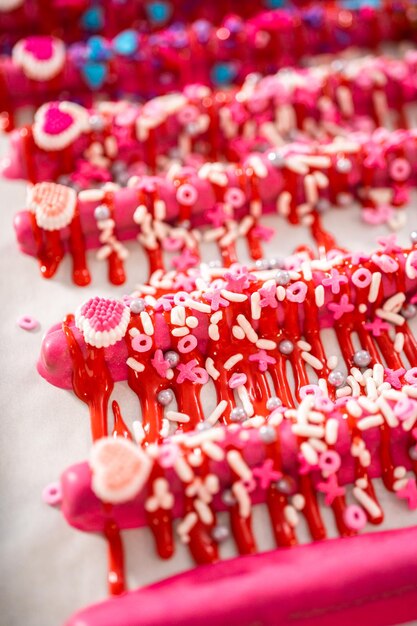 Photo valentine's day chocolate covered pretzel rods