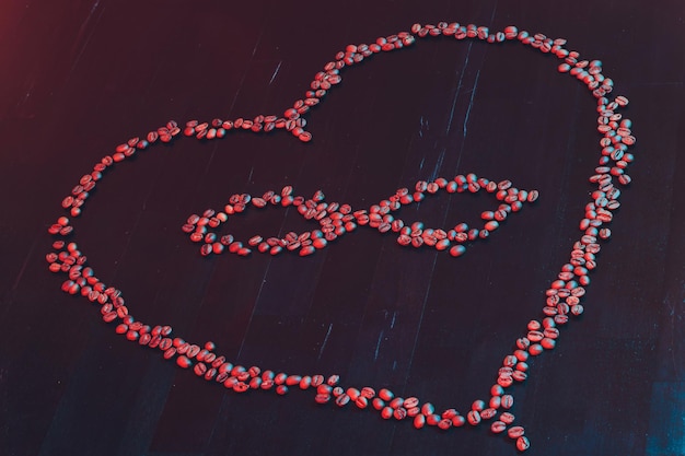 Valentine's Day concept polyamory symbol heart and infinity sign in the middle coffee beans