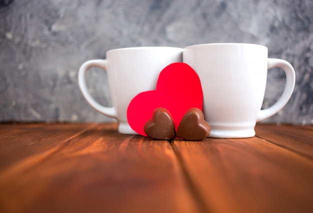 Valentine's day cup with coffee and red hearts.copy space valentine concept. View from above.