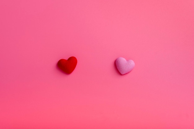 Valentine's Day Mother's Day Birthday Two decorative hearts in the middle on a pink background