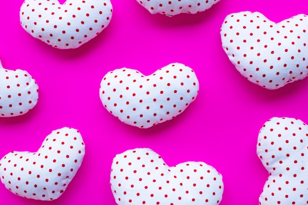 Valentine's hearts on pink background