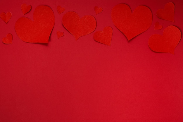 Valentines Day background Red hearts on red background Valentines day concept