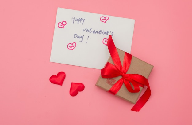 Valentines day background, Valentines day card and gift box on pink background