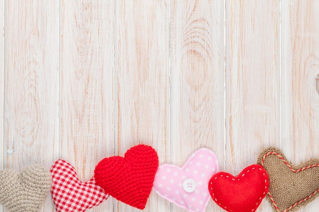 Valentines day background with toy hearts