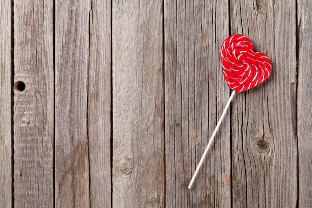 Valentines day candy heart on wooden table