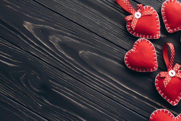 Valentines day concept Hand make yarn red heart beside wooden block calendar set on Valentines date 14 February on table and bright room background Happy valentine day