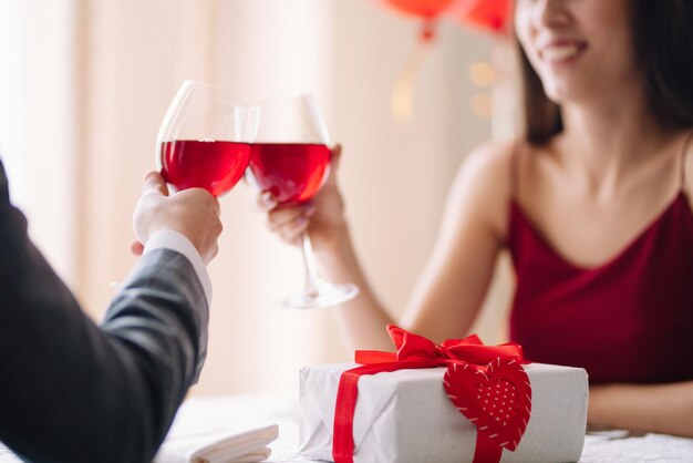 Valentines Day concept Happy couple in love with Couple celebrating Valentines Day in restaurant