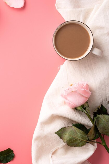 Valentines Day design concept background with pink rose flower and milk tea on pink table background