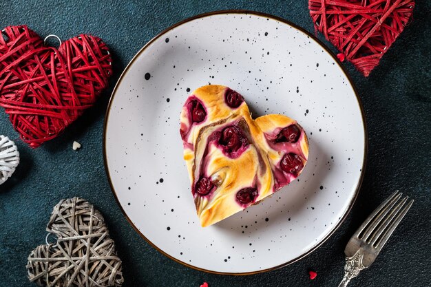 Valentines day dessert. Valentines dessert. Heart shaped cheesecake brownie with cherry. Mothers Day dessert. Fathers day dessert. Womens day cake. Heart cheesecake. Heart cake.