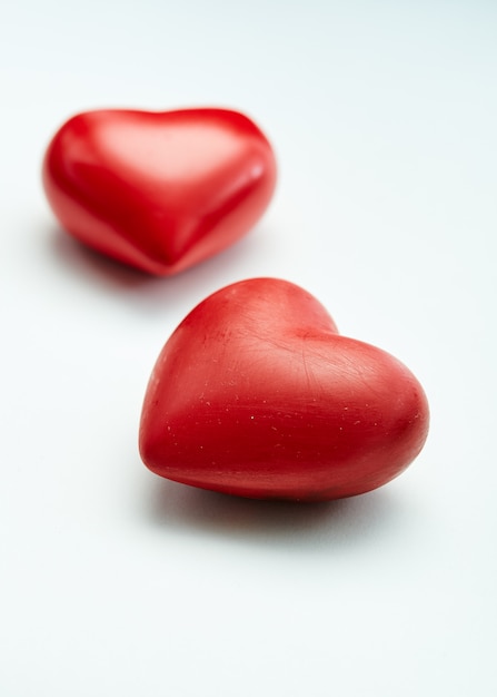 Valentines day  festival Two decorative red hearts isolated on white background