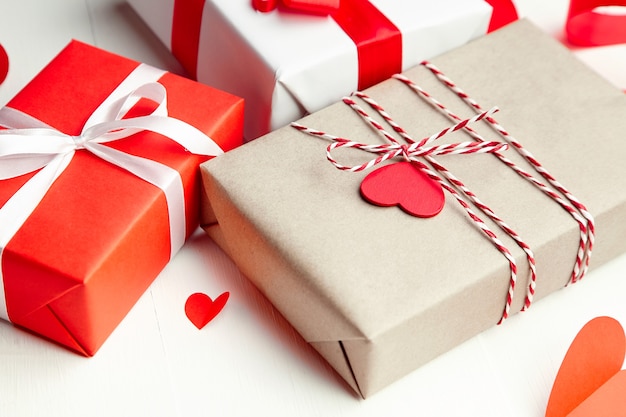 Valentines day gift boxes decorated with red paper hearts