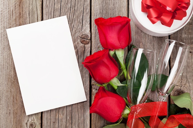 Valentines day greeting card gift box and red roses