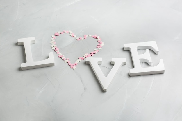 Valentines day holiday text word love with pink heart