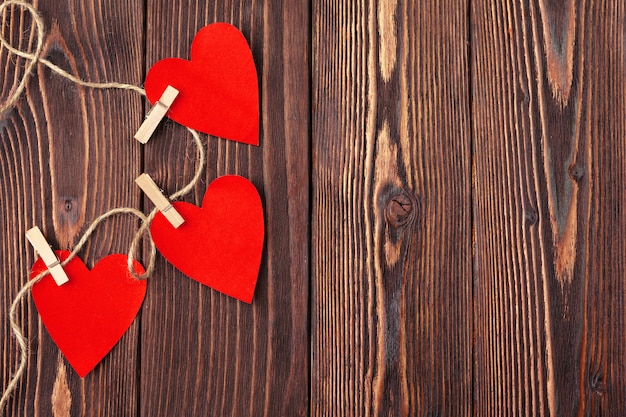 Valentines day red heart on old wood. Holidays background.