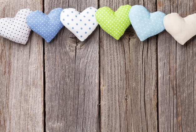 Valentines day toy hearts on wood