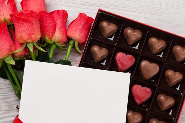 Valentines day with red roses and chocolate