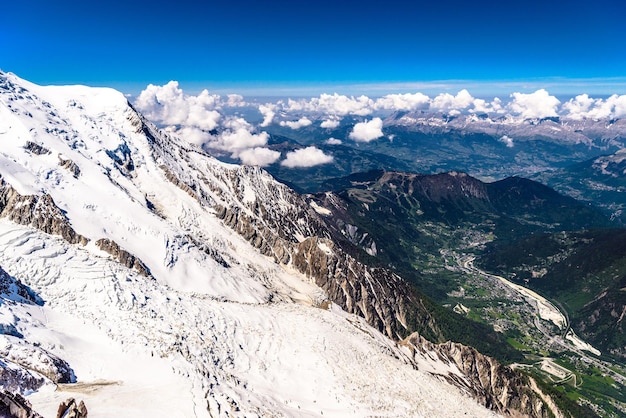 Valley with villages between snowy mountains Chamonix Mont Blanc HauteSavoie Alps France