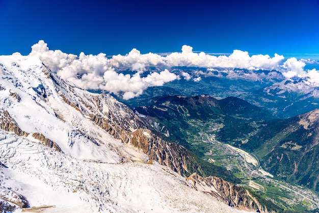 Valley with villages between snowy mountains Chamonix Mont Blanc HauteSavoie Alps France