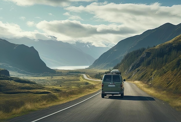 a van is driving down the road in the mountains in the style of expansive spaces