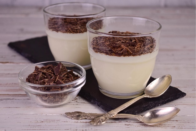 Vanilla dessert with grated chocolate. Vanilla pudding. 