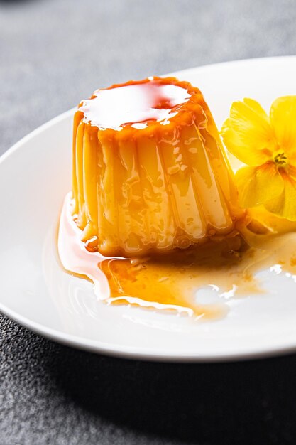 vanilla flan caramel sauce sweet dessert cream caramel meal food snack on the table copy space