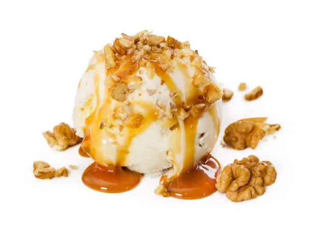 Vanilla ice cream with walnut and caramel isolated on white background