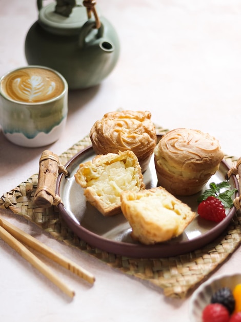 Vanilla Soes Cakes served in plate. In Indonesia it called Kue Soes