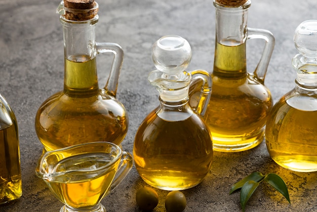 Variety of bottles filled with olive oil