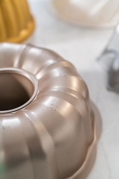 Variety of bundt cake pans on the kitchen counter