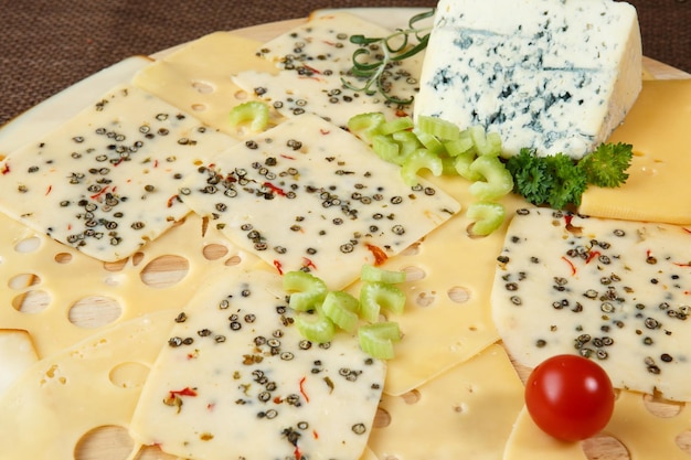 Variety of cheeses on a cutting board