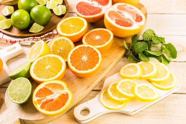 Variety of citrus fruit including lemons, lines, grapefruits and oranges.