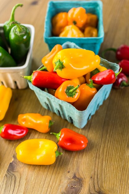 Variety of fresh organic peppers on the table.