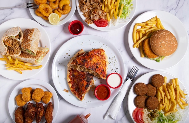 Variety of Pakistani fast food dishes view from above