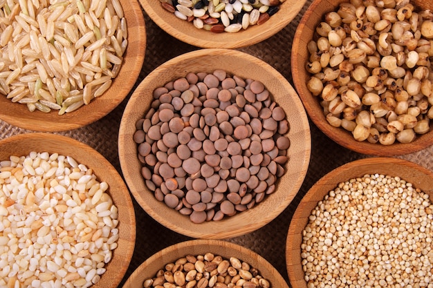 Variety of rice and grains in bowls 