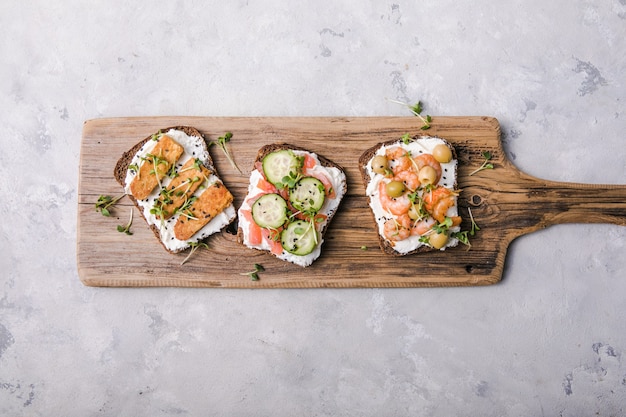 Variety of sandwiches for breakfast with microgreens