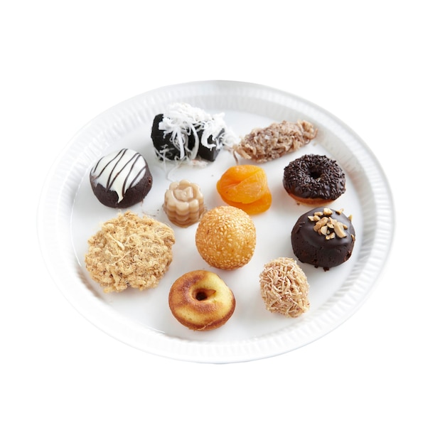 Variety sweet baked on plate isolated on background