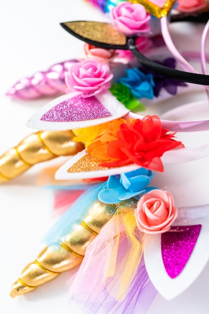 Variety of unicorn headbands on a white background.