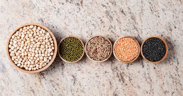 Various assortment of legumes - beans, chickpeas, lentils, black  and green orid dal. Vegetable proteins.