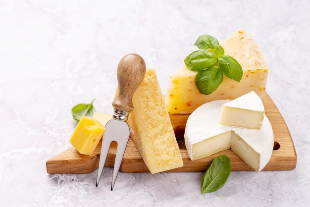 Various cheese on board