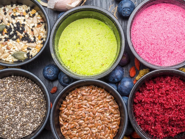 Various colorful superfood powders cleasing and detox concept