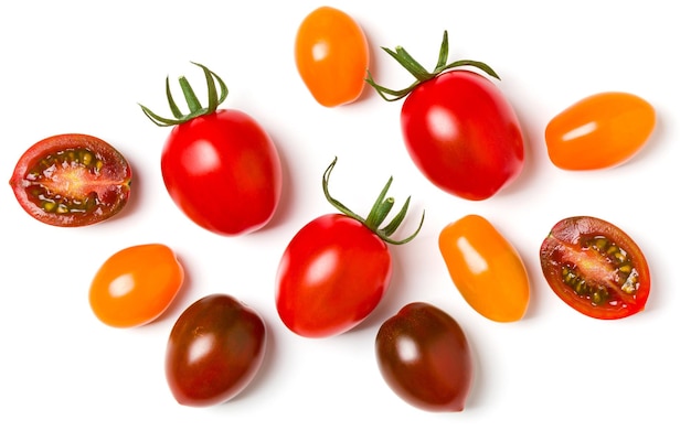 Various colorful tomatoes isolated on white background Top view flat lay Creative layout