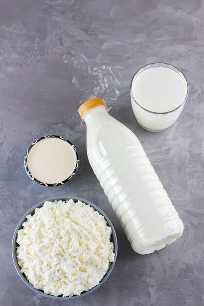 Various dairy products Healthy dairy products on a gray background Milk sour cream