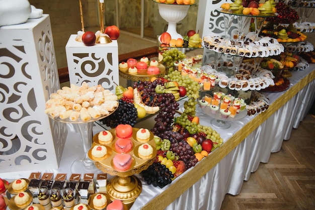 Various dessert with fresh fruit on buffet line sweet