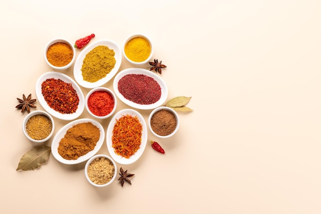 Various dried spices in small bowls