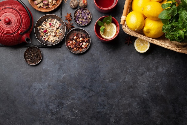 Various dried tea and teapot